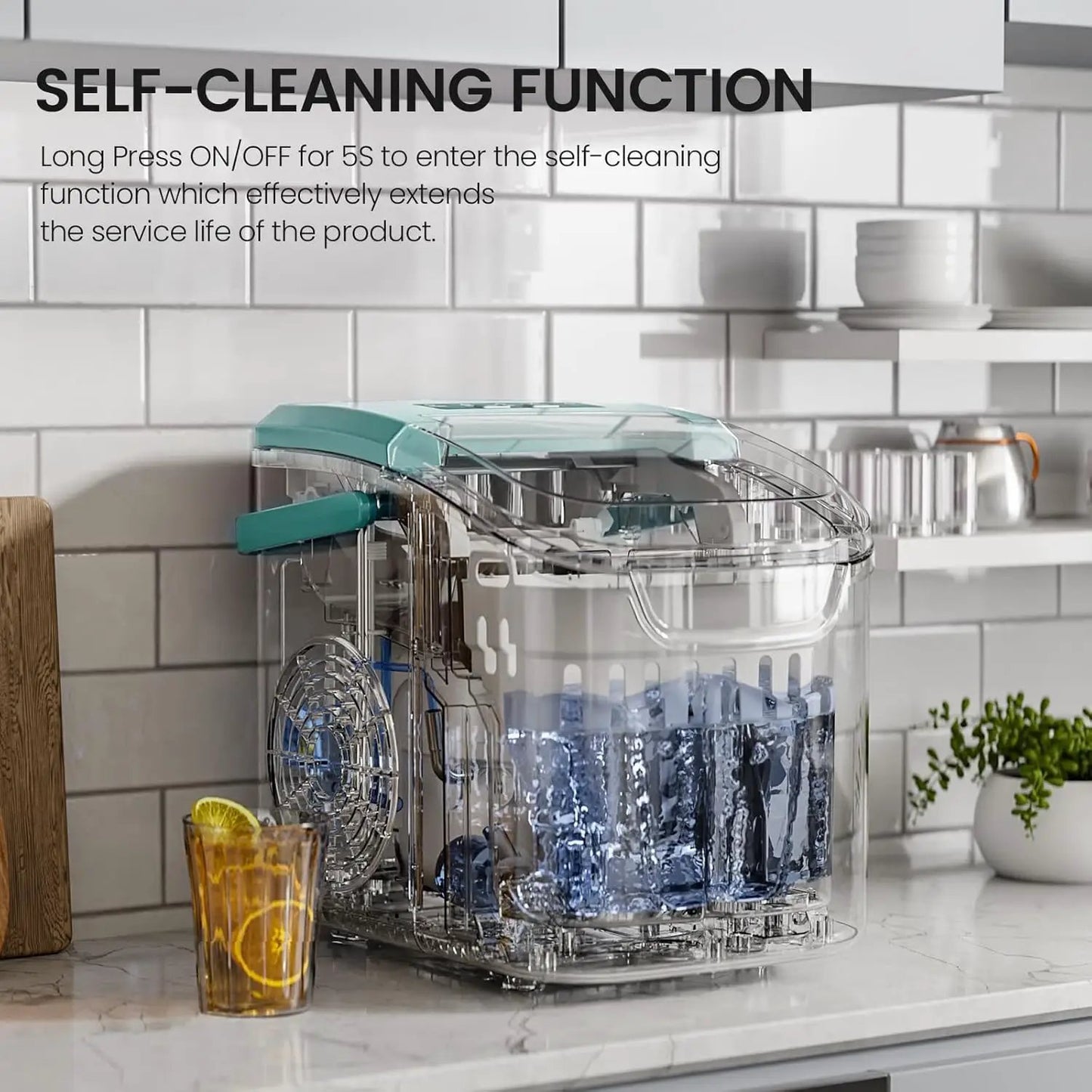 Kismile countertop ice maker with teal lid and clear body on marble kitchen counter on Tampa Home & Garden Store
