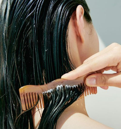 LADOR ACV Vinegar Treatment 530ml hair treatment for dark hair brushed with a brown comb on Tampa Home & Garden Store