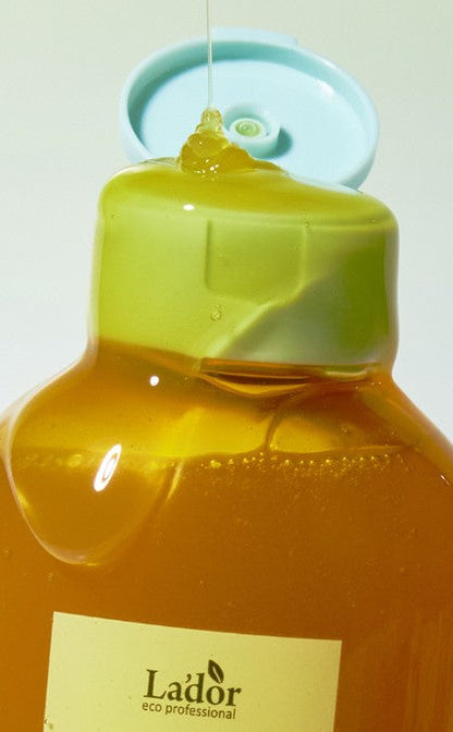 Lador Root Re-Boot Shampoo bottle with amber liquid and mint-green cap on Tampa Home & Garden Store