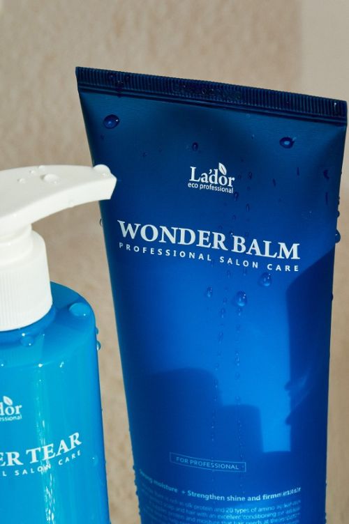 Lador Wonder Balm 200ml hair treatment in blue tube by Seoulia, two bottles shown on display on Tampa Home & Garden Store