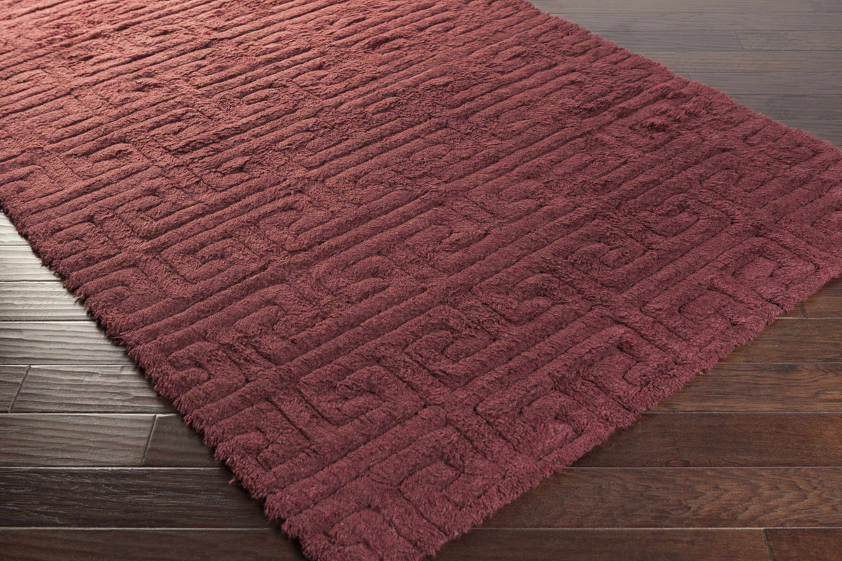 Lakota Area Carpet burgundy shag with ribbed texture by Boutique Rugs on dark wood floor on Tampa Home & Garden Store
