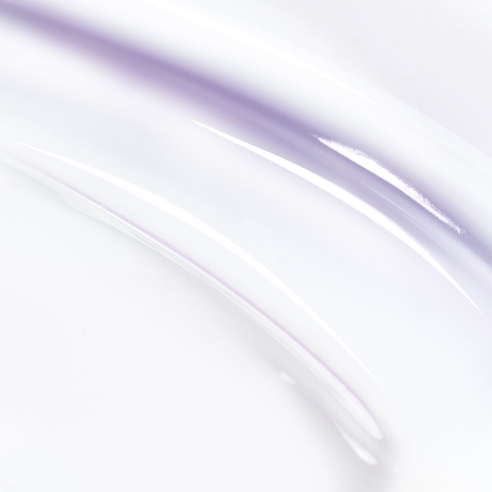 Lancome Renergie Eye Cream swirl on glossy white surface with lavender tint on Tampa Home & Garden Store