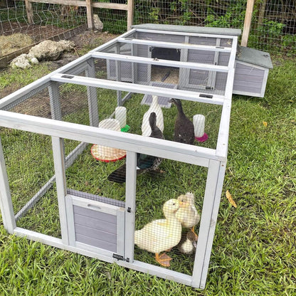Large 103-inch chicken coop with run and nesting box, gray wood and wire mesh enclosure on Tampa Home & Garden Store