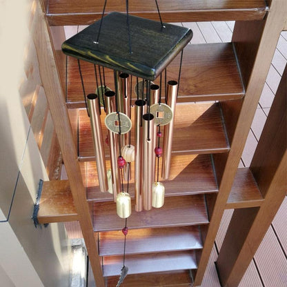 Stevvex large copper money pendant wind chime with metal tubes, coin discs, and pink beads on Tampa Home & Garden Store