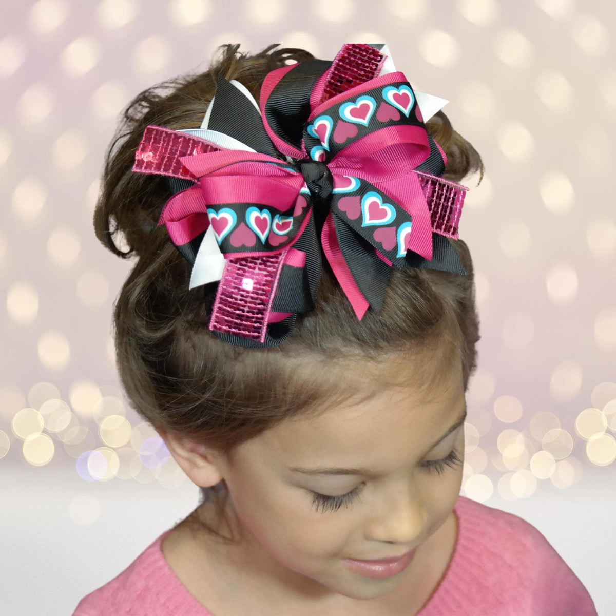 Large Sequin Boutique Hair Bow by Chicky Chicky Bling Bling in pink black heart print on Tampa Home & Garden Store