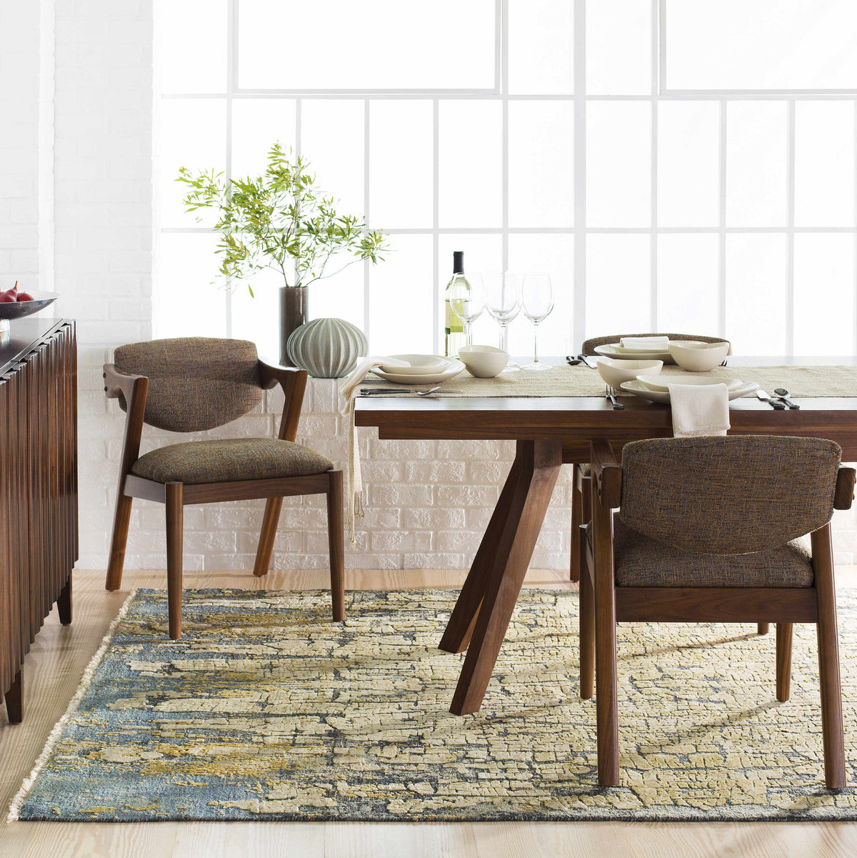 Latour Carpet by Boutique Rugs, blue and cream distressed area rug under dining table on Tampa Home & Garden Store
