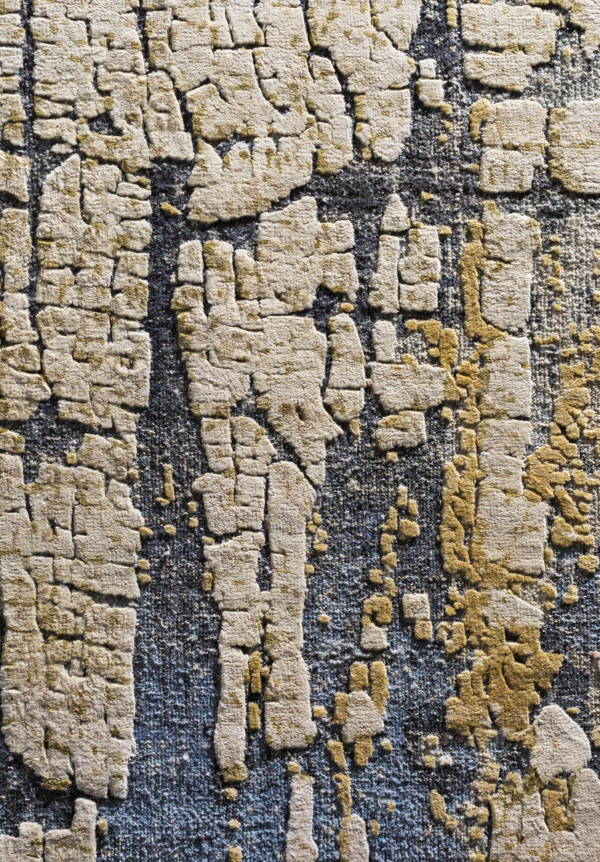 Latour Carpet rug by Boutique Rugs in beige textured block pattern on dark backdrop on Tampa Home & Garden Store