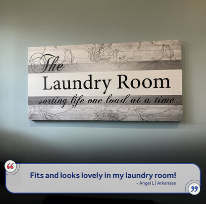 Laundry Room sign canvas by Tailored Canvases; wood-look panel with floral line art and bold Laundry Room text on Tampa Home & Garden Store
