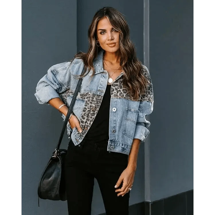 Denim leopard print trucker jacket with stitched panels and lapel long sleeves on model Stevvex on Tampa Home & Garden Store
