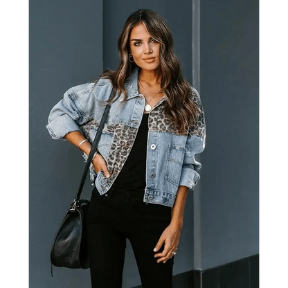 Denim leopard print trucker jacket with stitched panels and lapel long sleeves on model Stevvex on Tampa Home & Garden Store