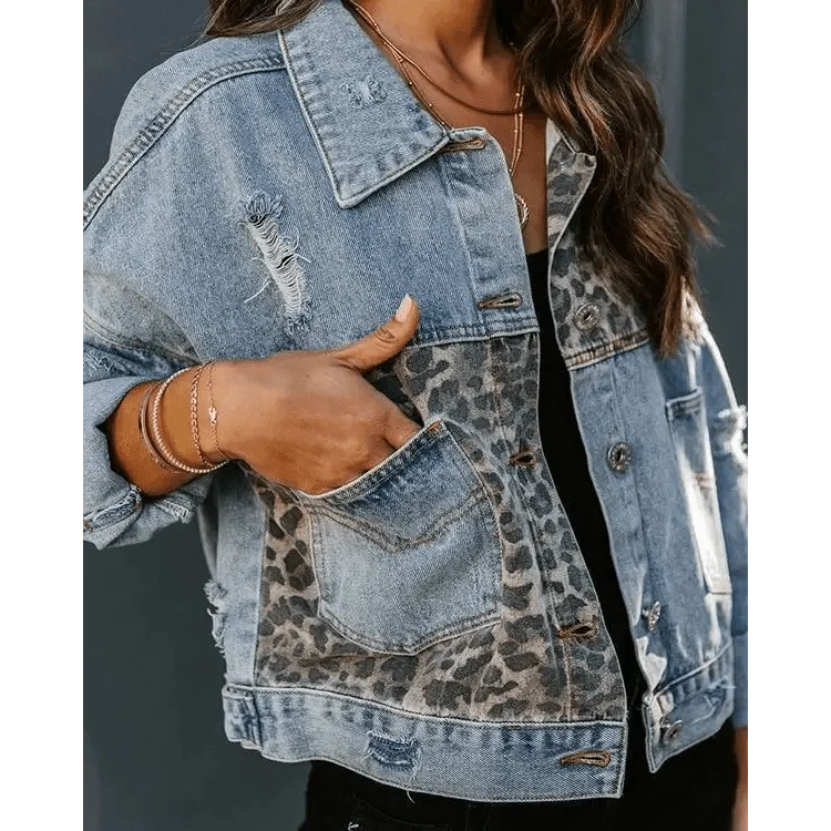 Denim trucker jacket with leopard print panel by Stevvex, distressed details on Tampa Home & Garden Store