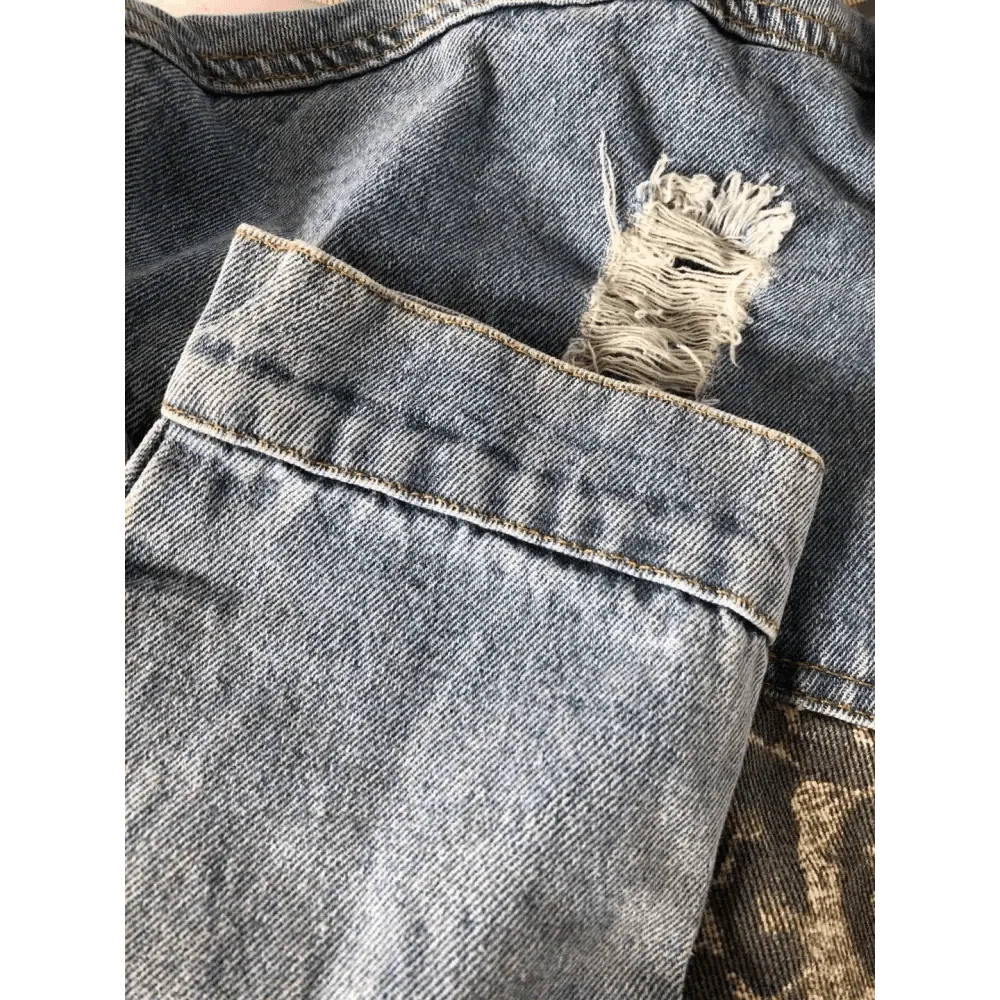 Denim trucker jacket Stevvex with distressed tear, light wash blue long sleeve on Tampa Home & Garden Store