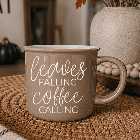 Leaves Falling mug by Gia Roma, taupe ceramic coffee cup with white script text on Tampa Home & Garden Store