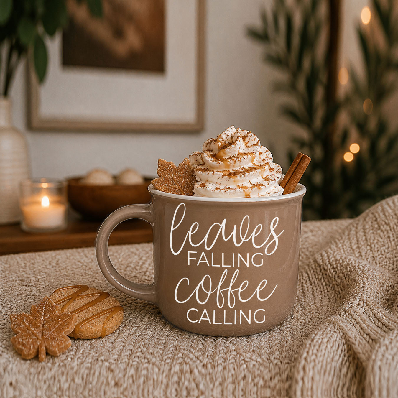 Leaves Falling mug by Gia Roma taupe ceramic with whipped cream; two cookies nearby on Tampa Home & Garden Store
