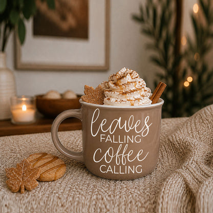 Leaves Falling mug by Gia Roma taupe ceramic with whipped cream; two cookies nearby on Tampa Home & Garden Store