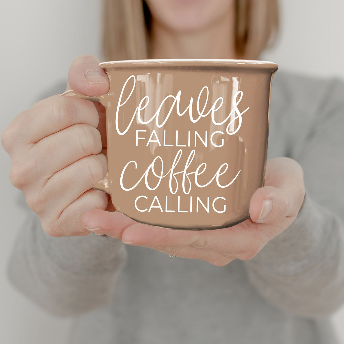 Leaves Falling coffee mug by Gia Roma in taupe ceramic with white script lettering on Tampa Home & Garden Store