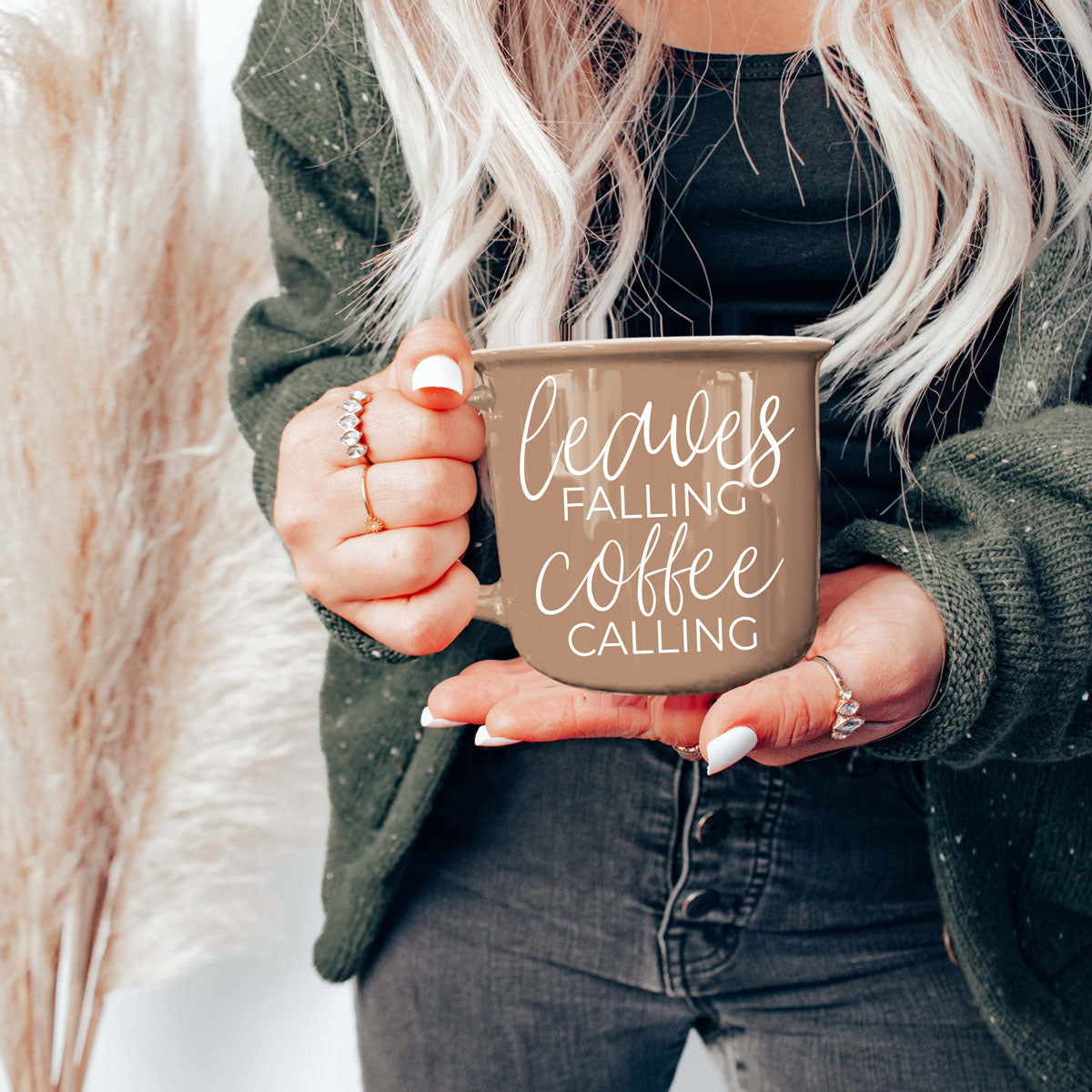 Leaves Falling mug brown ceramic with white script text held by hands on Tampa Home & Garden Store