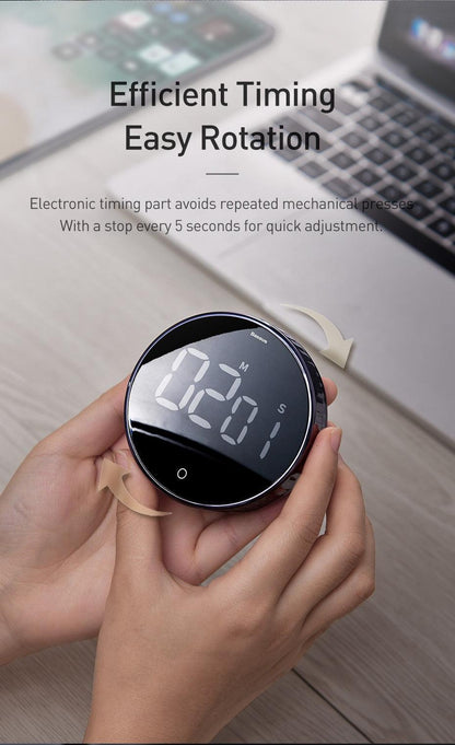 Round black LED kitchen timer held in hands, countdown display, magnetic cooking timer on Tampa Home & Garden Store