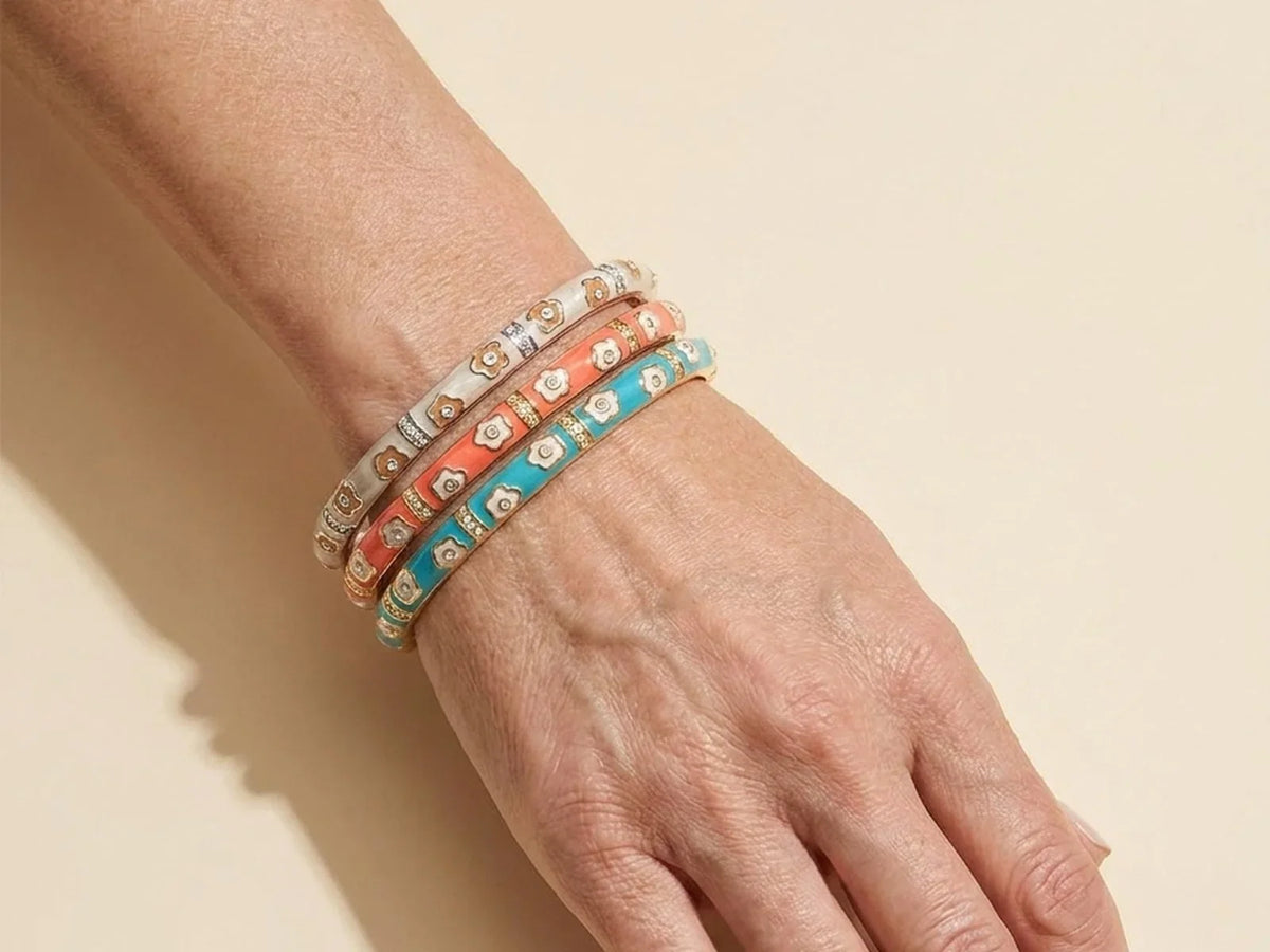 Stackable Daisy Love bracelets in cream, coral, teal and blue by Lauren G Adams on Tampa Home & Garden Store