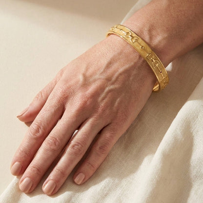 Equestrian Stirrup Bangle champagne gold-tone slip-on bracelet by Lauren G Adams on wrist on Tampa Home & Garden Store