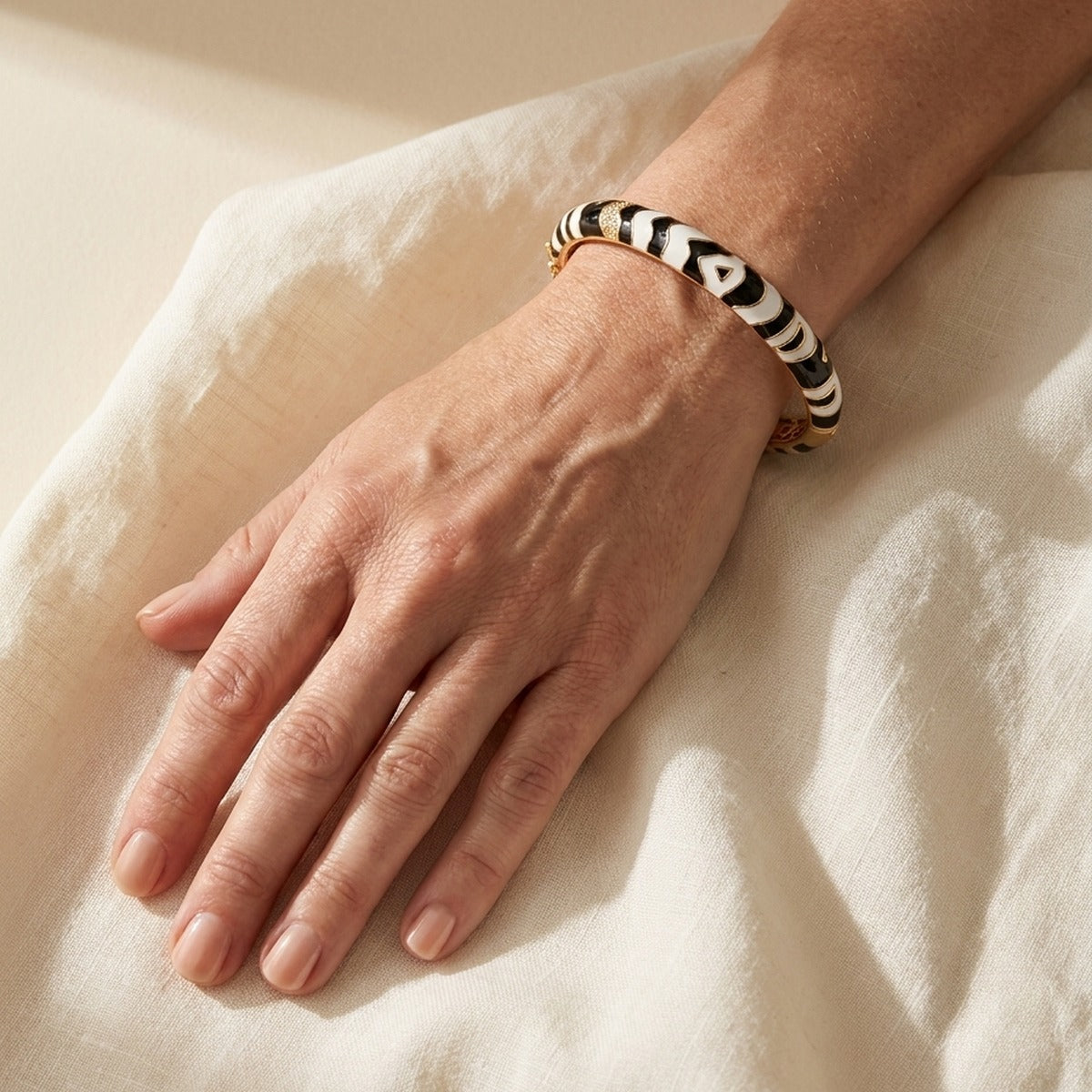 Animal Paradise Zebra Hinge Bangle bracelet in black white with gold trim by Lauren G Adams on Tampa Home & Garden Store