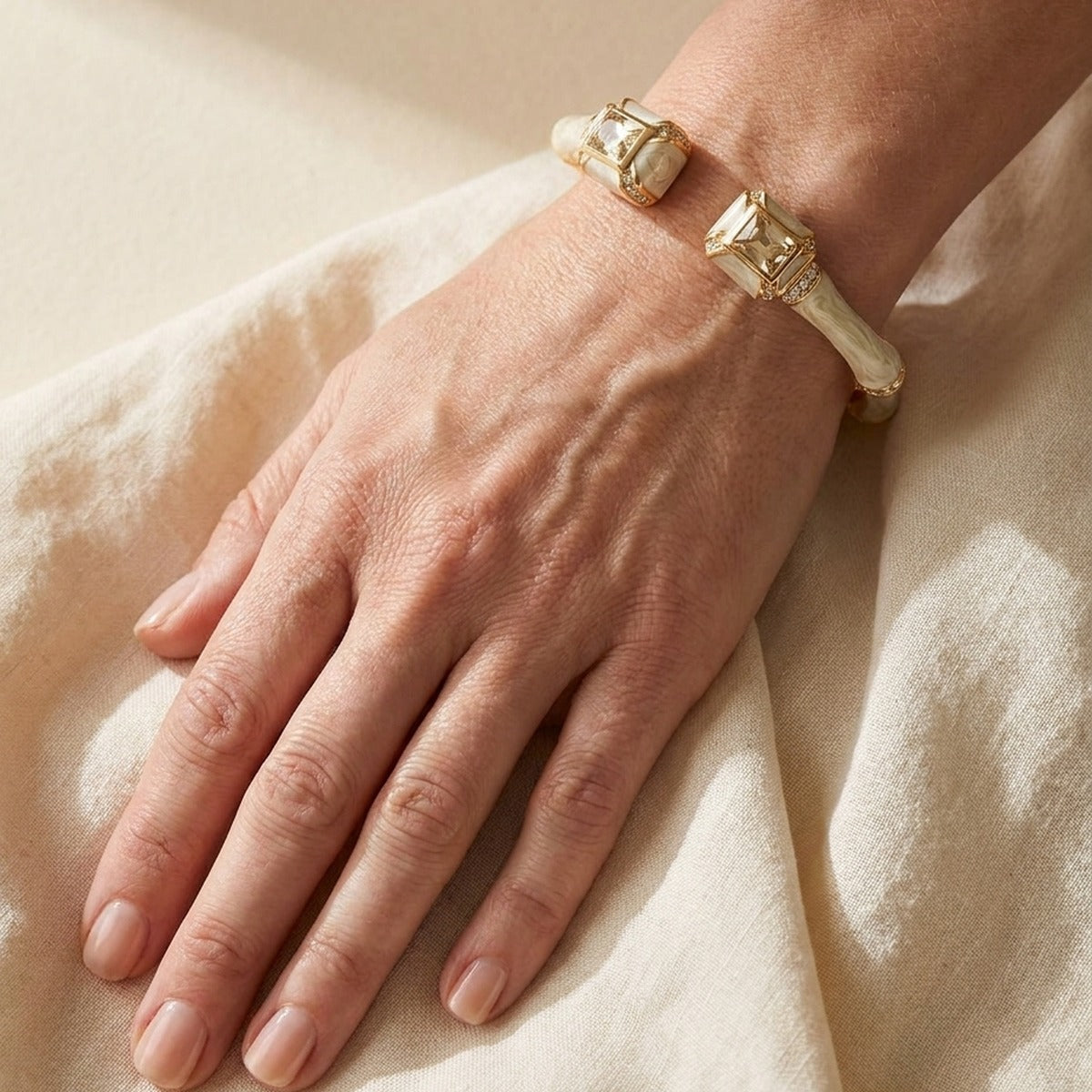 Bamboo Bangle Hinged Bracelet in ivory bamboo with crystal-tipped gold-tone ends on Tampa Home & Garden Store