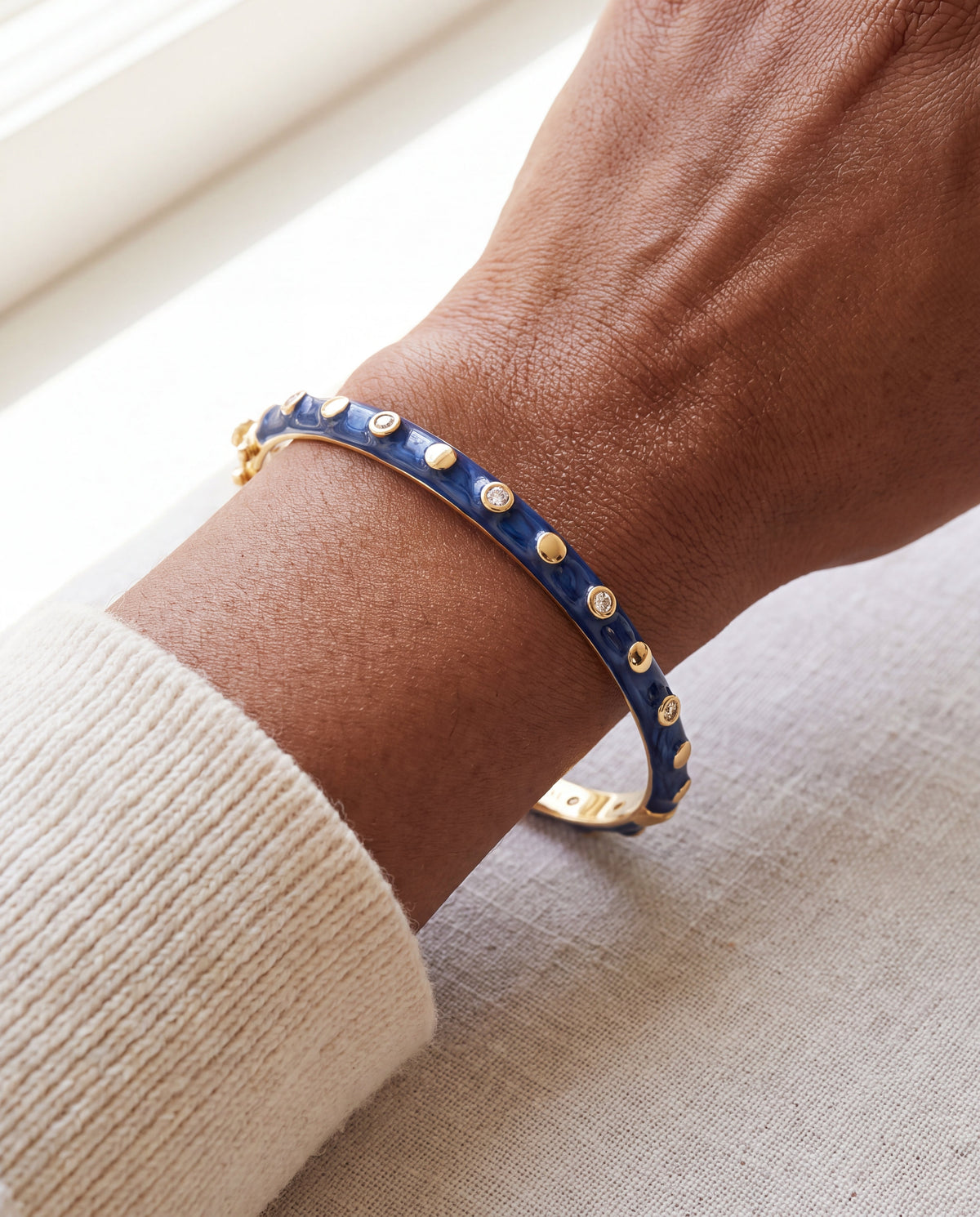 Stackable Fiesta Dot Bangle blue enamel bracelet with gold studs and crystal accents Lauren G Adams on Tampa Home & Garden Store
