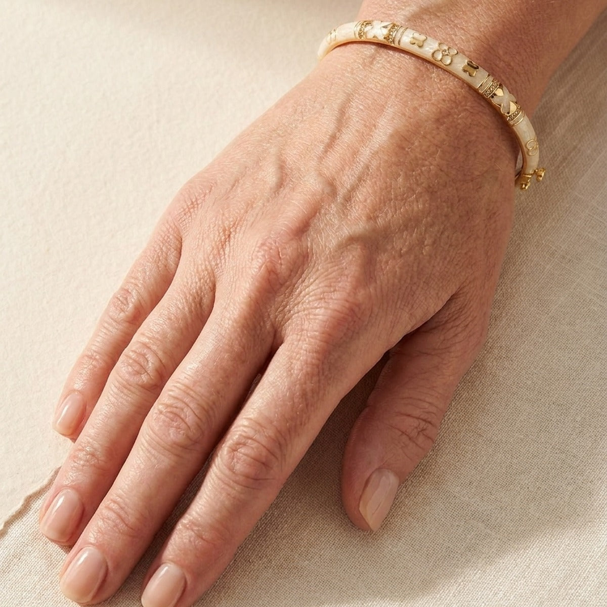 Floral Knight Stackable Bangle, slim pavé station bracelet in gold tone by Lauren G Adams on Tampa Home & Garden Store