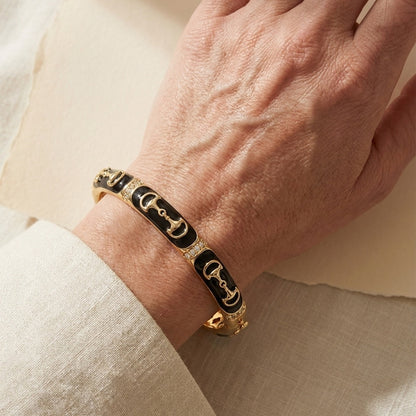 Equestrian Bangle Black Snaffle gold-tone bracelet with black enamel panels and crystal accents on Tampa Home & Garden Store