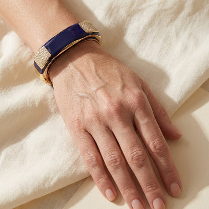 Curvy Swirls Bangle by Lauren G Adams, gold-tone bracelet with blue enamel center and pavé ends on Tampa Home & Garden Store