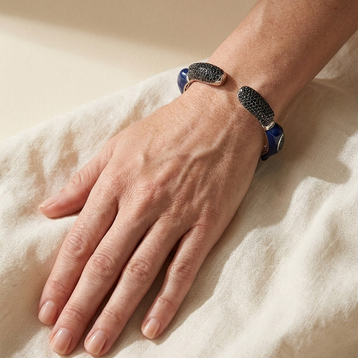 Lauren G Adams Earth Wind and Fire hinged bangle bracelet in blue enamel with peaked pavé tips on Tampa Home & Garden Store