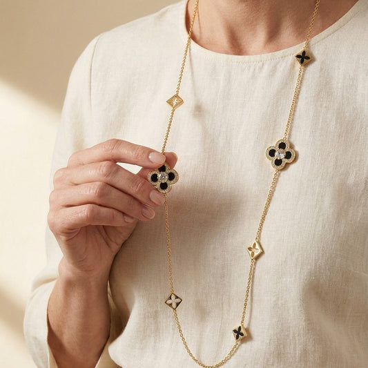 Floral Knight Clover long necklace by Lauren G Adams, gold chain with black enamel clover charms on Tampa Home & Garden Store