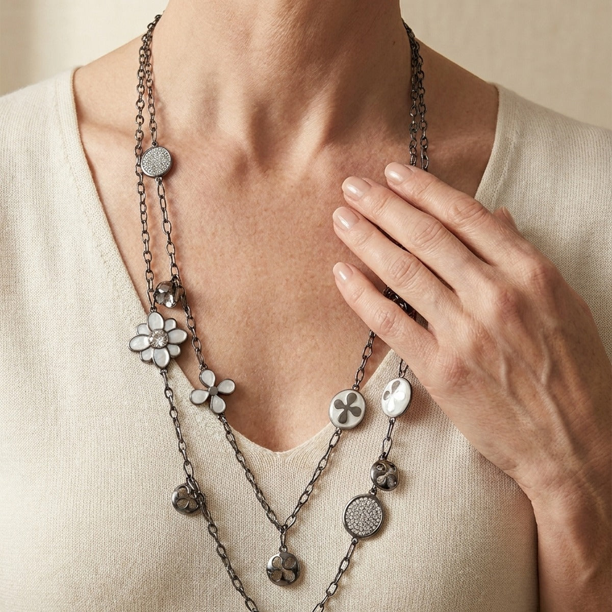 Beautiful Blossom multi-chain necklace with silver-tone chains and white enamel flowers on Tampa Home & Garden Store