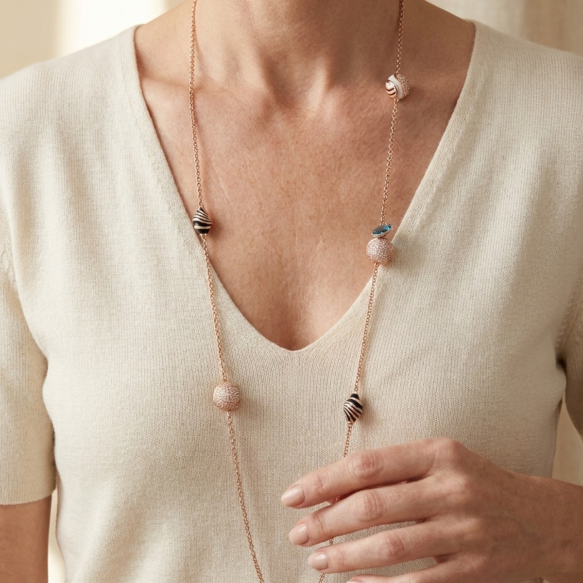 Angel Wings Long Necklace by Lauren G Adams, rose-gold chain with striped beads on Tampa Home & Garden Store