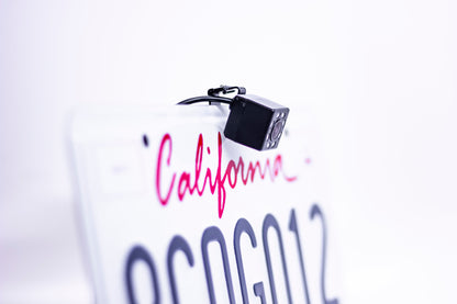 Master Tailgaters license plate camera with 8 IR LEDs in black housing on a California plate on Tampa Home & Garden Store