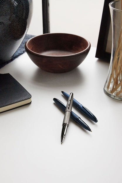 ATX Brushed Chrome Ballpoint Pen with clip beside two blue pens on Tampa Home & Garden Store