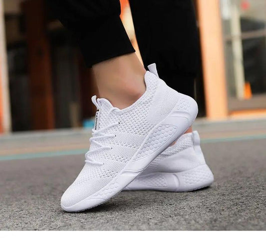 Light Stevvex white men's running shoes with breathable knit upper, low-top lace-up sneakers on Tampa Home & Garden Store