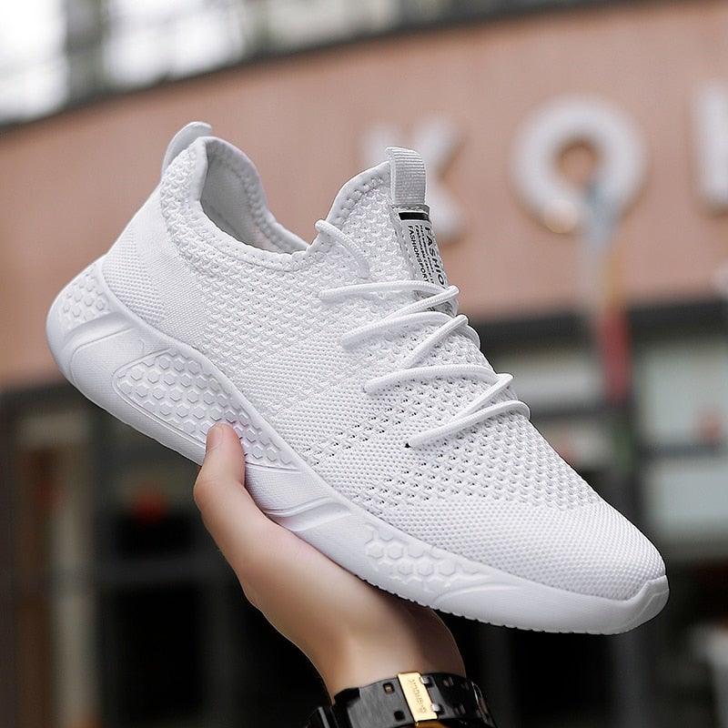 Stevvex white mesh sneakers for men, breathable casual athletic shoe with a non-slip sole on Tampa Home & Garden Store