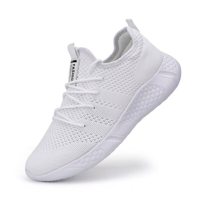 Stevvex white mesh sneakers breathable knit upper lightweight casual athletic footwear on Tampa Home & Garden Store