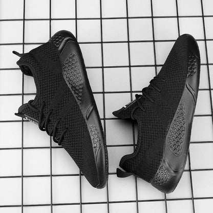Stevvex men's black mesh sneakers pair with breathable knit upper and honeycomb outsole on Tampa Home & Garden Store