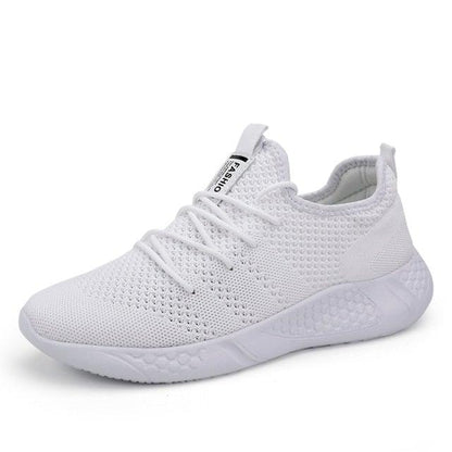 White mesh sneakers for men by Stevvex with breathable knit upper, lace-up, cushioned sole on Tampa Home & Garden Store