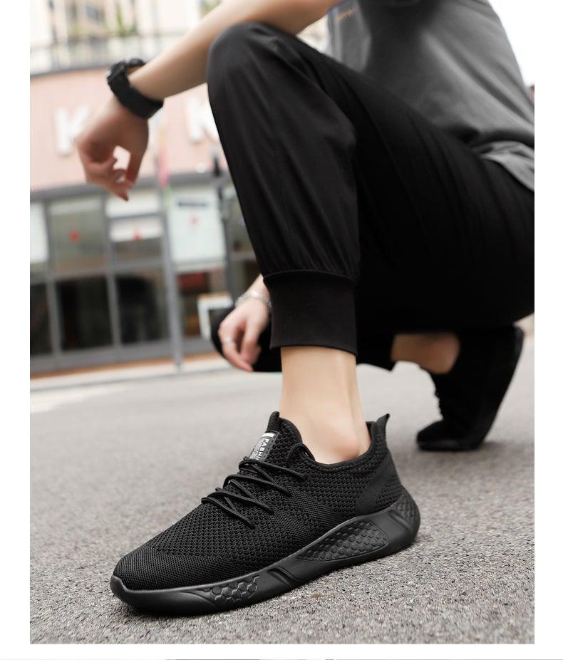Stevvex men's black mesh running sneakers with breathable knit upper and non-slip sole on Tampa Home & Garden Store