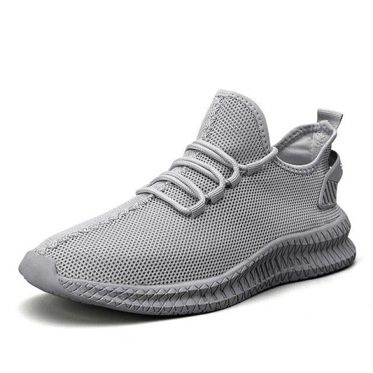 Light gray mesh running sneaker for men with breathable upper and textured sole on Tampa Home & Garden Store