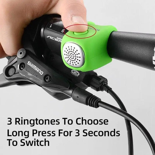 Green bicycle bell horn with speaker grille on handlebars beside Shimano lever 90dB on Tampa Home & Garden Store