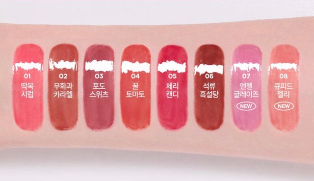 lilybyred Sugar Wrapping Tint Gloss lip gloss swatches by Seoulia, 8 pink-to-coral shades on arm on Tampa Home & Garden Store