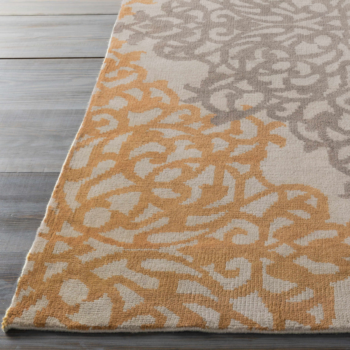 Lisle Wool Area Rug beige and orange motif Boutique Rugs on Tampa Home & Garden Store