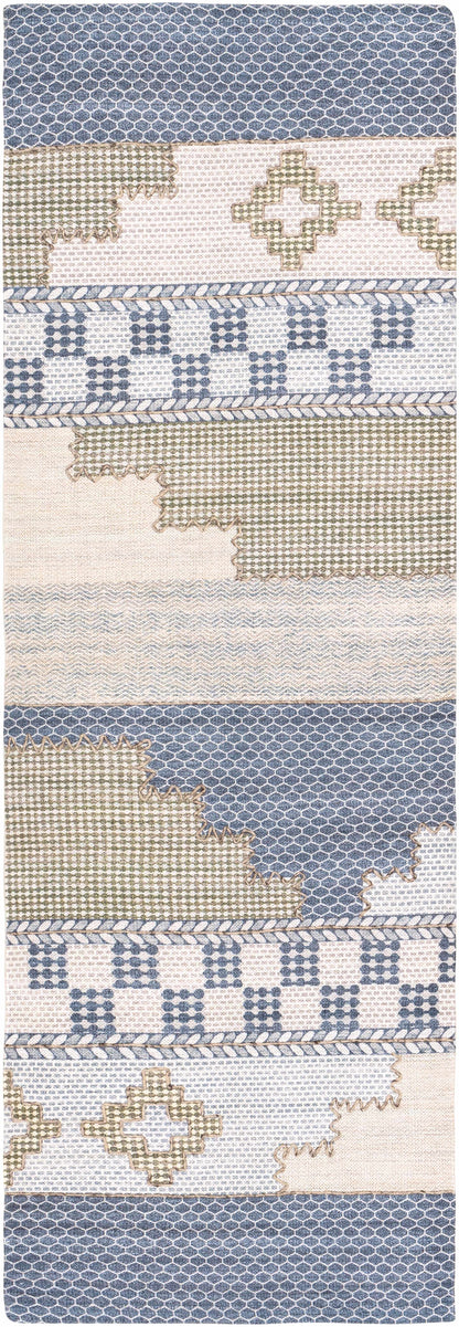Llansteffan Carpet rug by Boutique Rugs in blue and beige patchwork with geometric motifs on Tampa Home & Garden Store