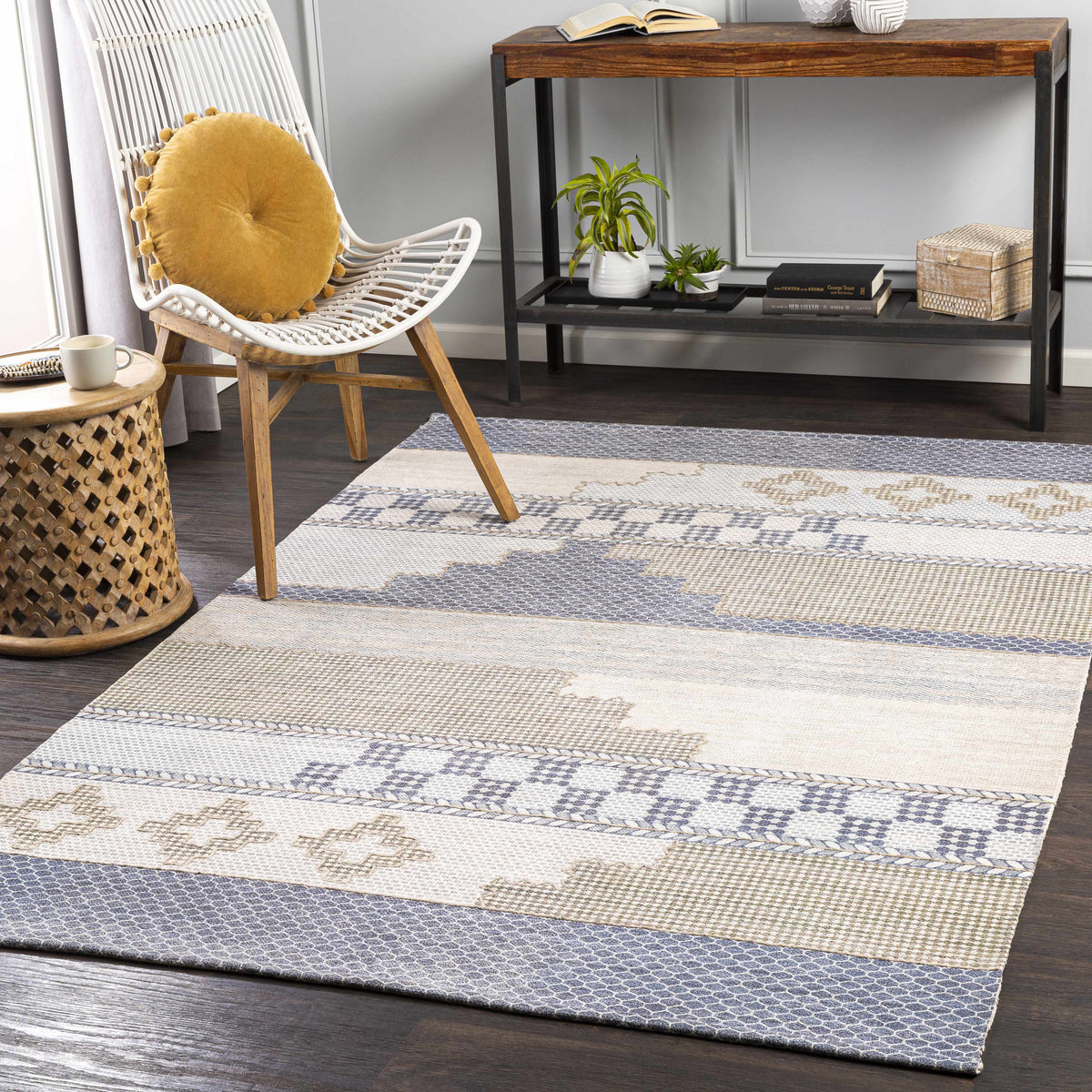 Llansteffan Carpet rug by Boutique Rugs in beige with blue-gray geometric accents on Tampa Home & Garden Store