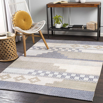 Llansteffan Carpet rug by Boutique Rugs in beige with blue-gray geometric accents on Tampa Home & Garden Store