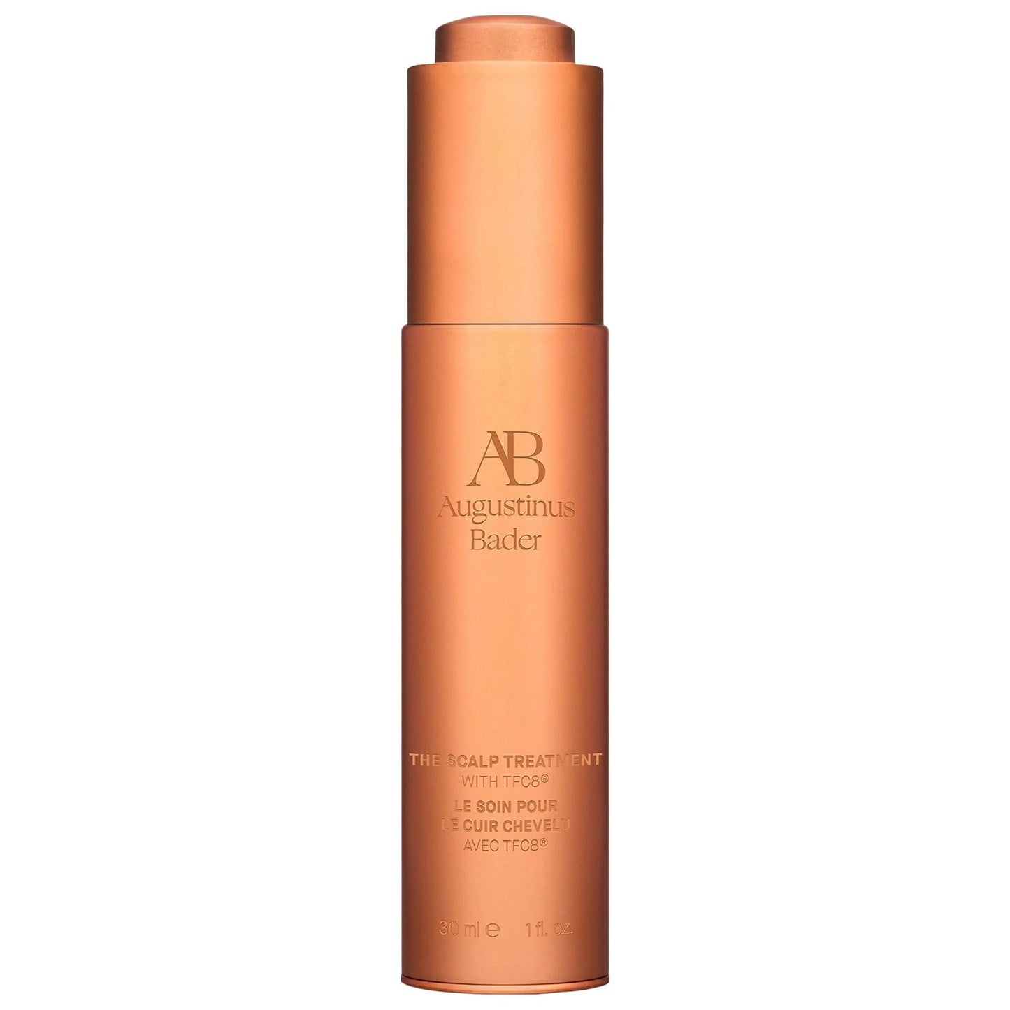 The Scalp Treatment bottle by Augustinus Bader, rose-gold cylindrical bottle on Tampa Home & Garden Store